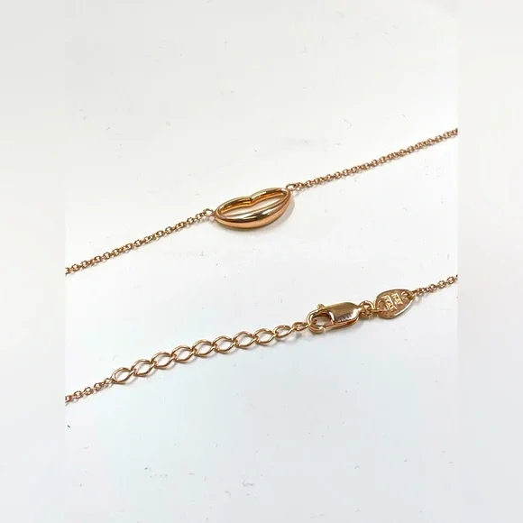 New, with no tag RCI necklace in of 14k rose gold.